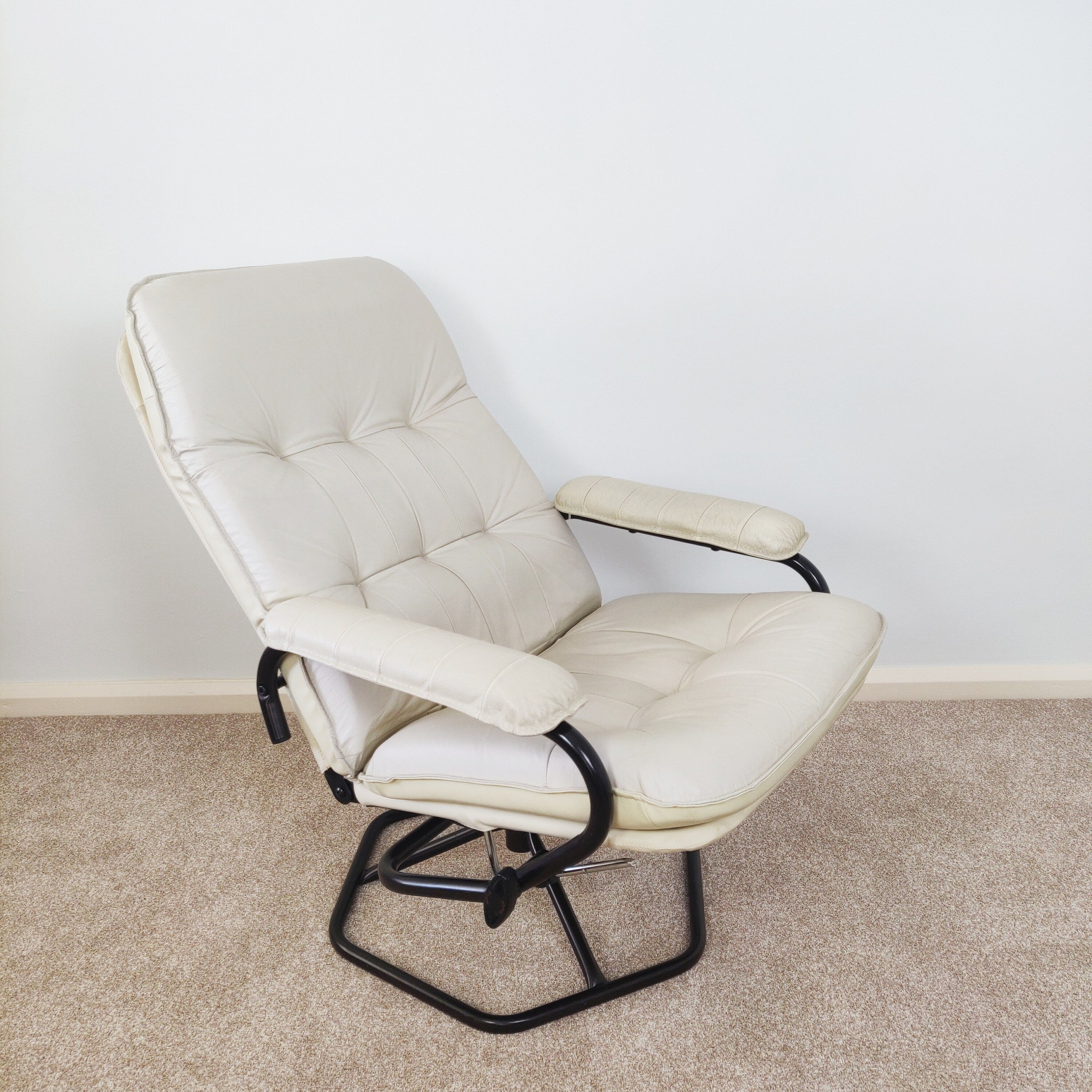 Mid Century Danish Leather Swivel Chair with foot stool by Unico,