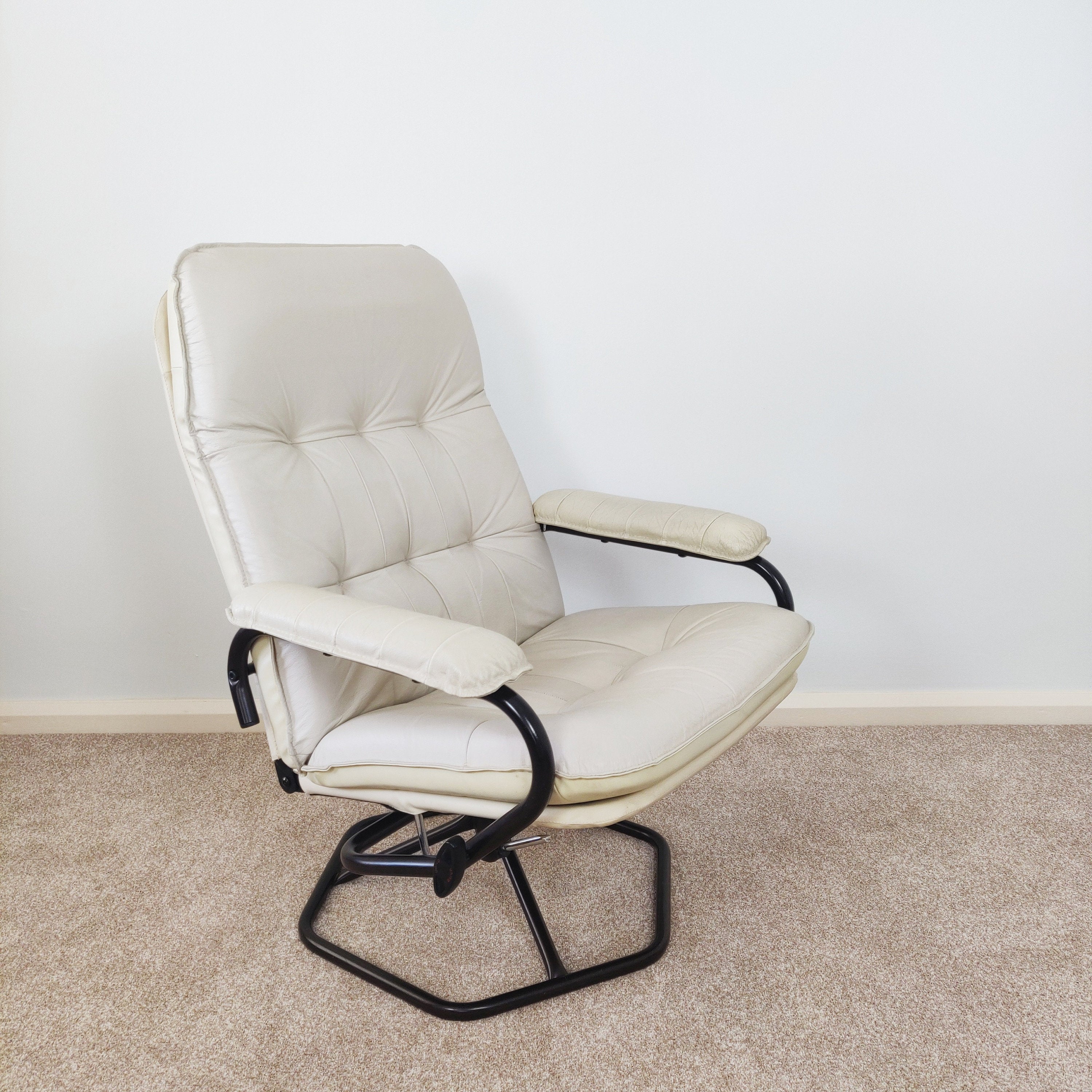 Mid Century Danish Leather Swivel Chair with foot stool by Unico,