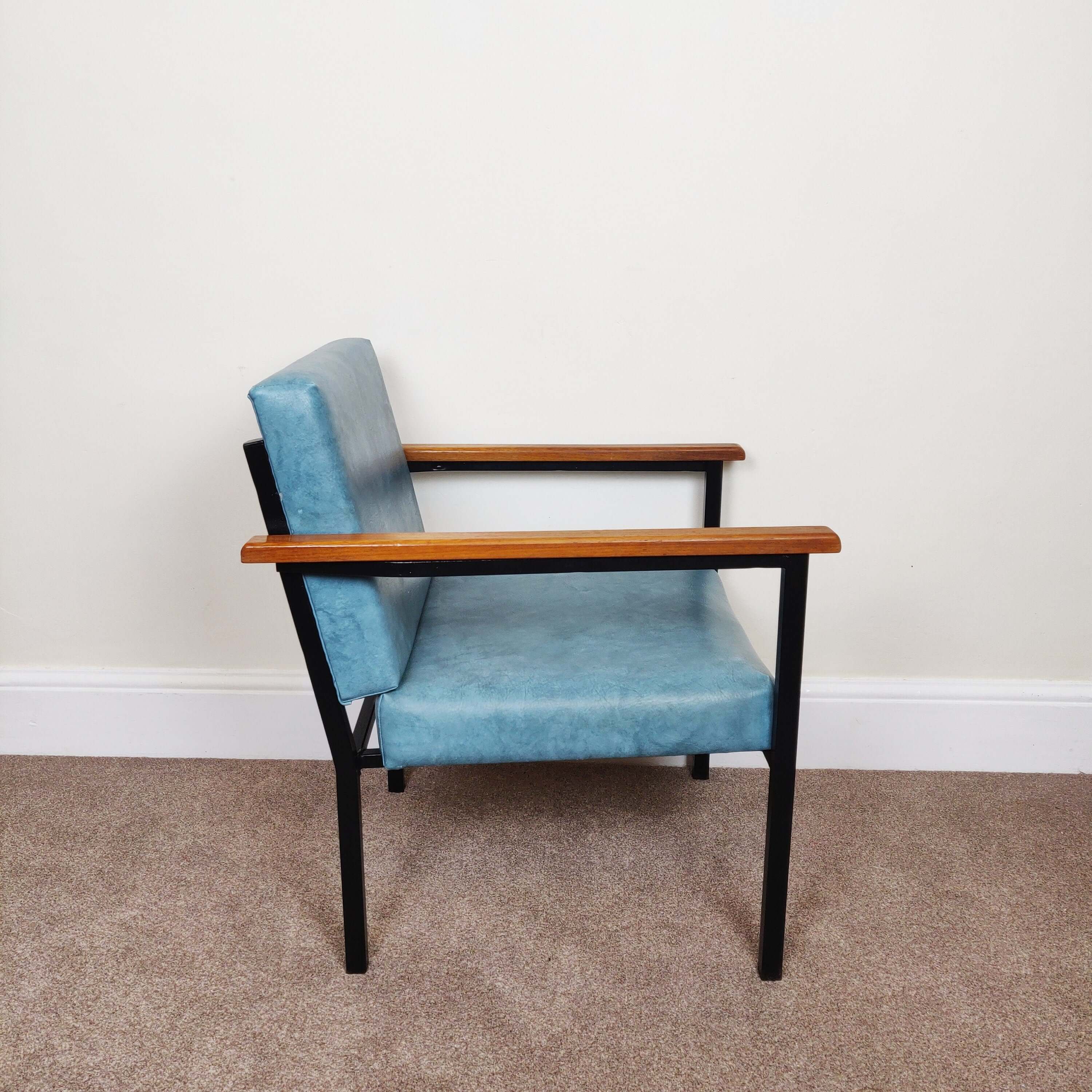 Blue mid century armchair side view