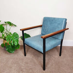 Load image into Gallery viewer, Blue mid century armchair facing left
