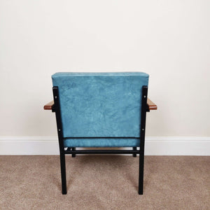 Blue mid century armchair view from back